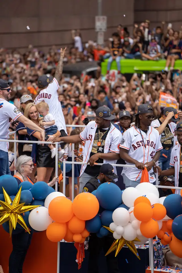 Confetti raining over parade crowds