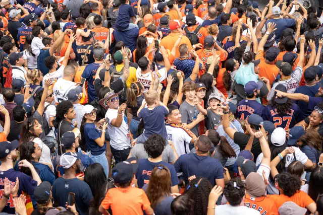 Crowd celebrating at the Astros World Series parade in Houston